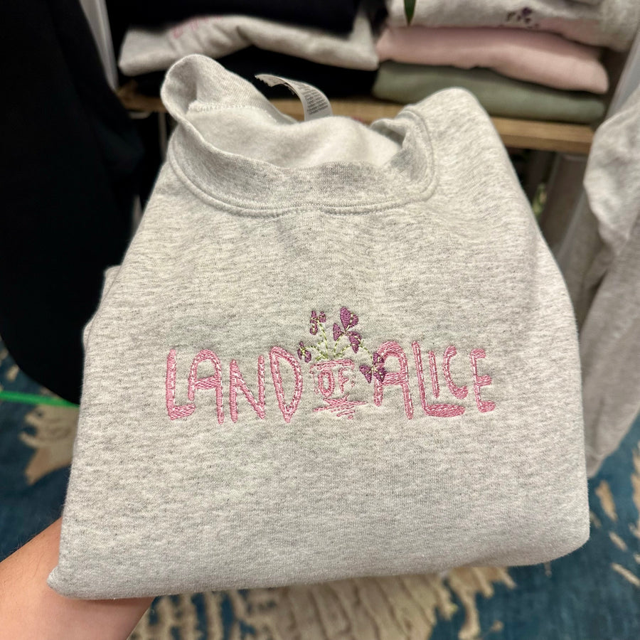Land of Alice embroidered crewneck sweater